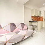 Modest 2Br At Jarrdin Cihampelas Apartment By Travelio